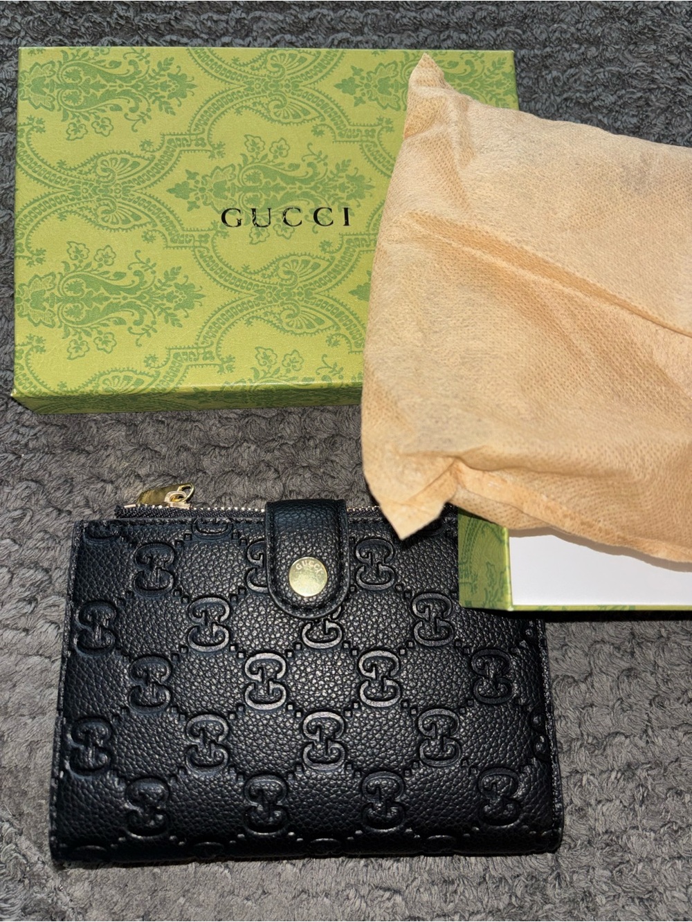 Gucci Black Embossed GG Leather Bifold Wallet